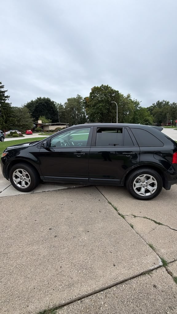 Black Ford Edge, side view