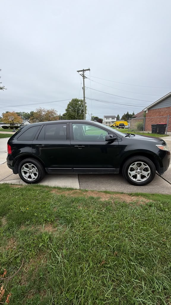 Black Ford Edge, angled side view