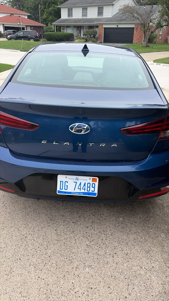 Blue Hyundai Elantra, rear view